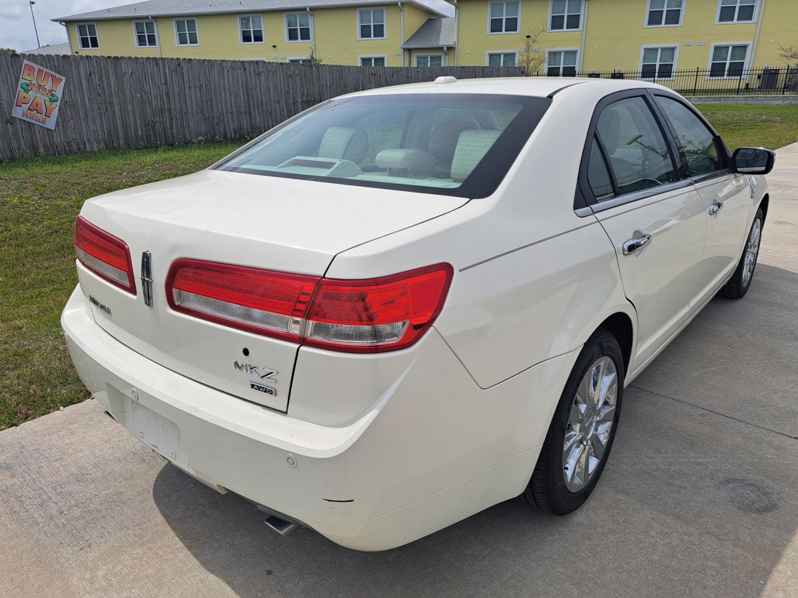 2012 White Lincoln MKZ AWD (3LNHL2JC5CR) with an 3.5L V6 DOHC 24V engine, 6-Speed Automatic transmission, located at 1181 Aurora Rd, Melbourne, FL, 32935, (321) 241-1100, 28.132914, -80.639175 - Photo #2